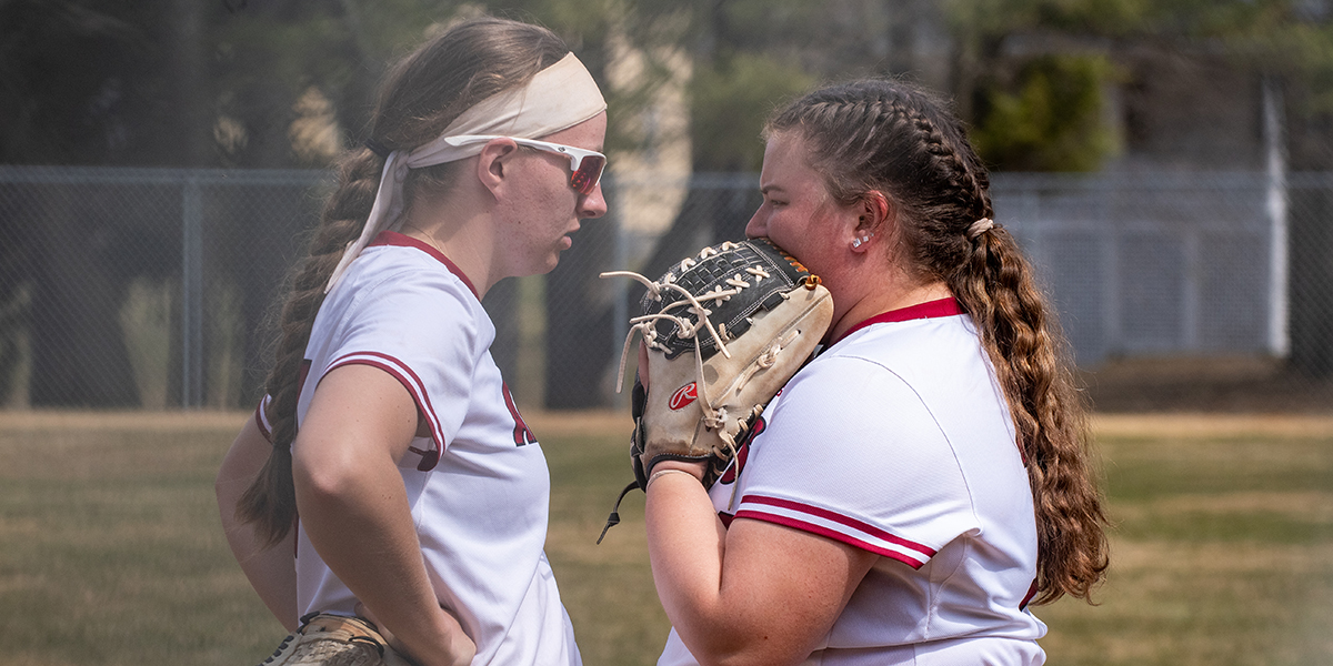 Senior first baseman Samantha Dahill (Littleton, MA) and graduate student designated player Sabrina Liston (Rehoboth, MA)